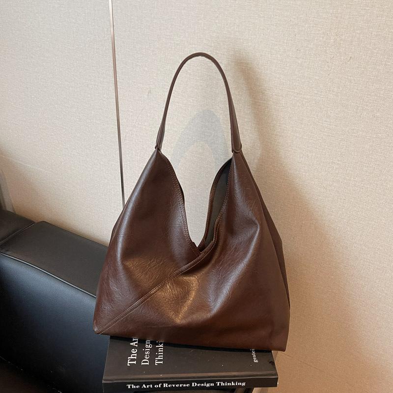 

Soft leather retro bag women s 2025 new fashionable large-capacity shoulder underarm bag casual solid color commuter tote bag