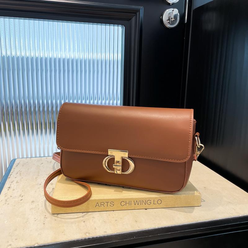 2025 einfarbige PU trendige personalisierte tägliche kleine Tasche einfache Damenhandtasche Umhängetasche Crossbody-Tasche Metallschnalle Damenhandtasche