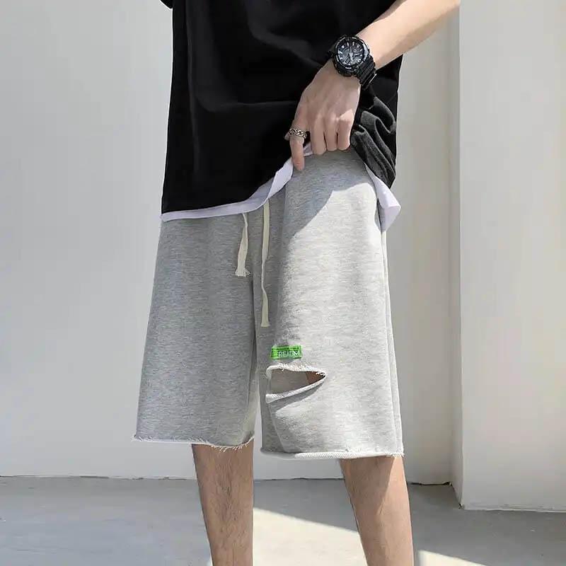 

Шорти з сірими дірками Чоловічі літні вільні прямі повсякденні штани Ins Style Спортивні штани Дихаючі прохолодні та зручні одноколірні штани з принтом у п’ять точок M