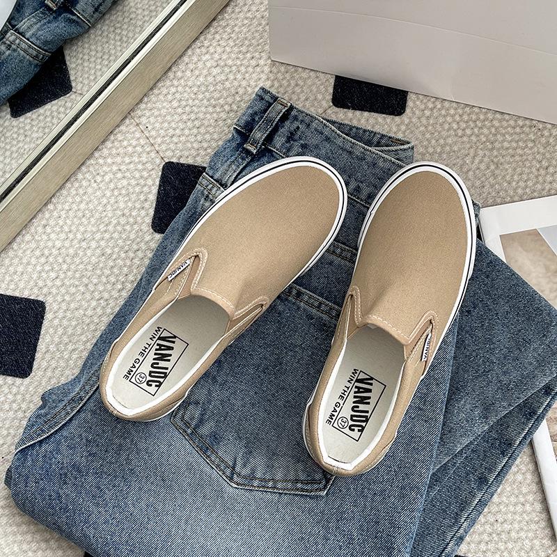 Chaussures Slip-On en toile unisexes 2026: Chaussures plates d'été décontractées style coréen pour étudiants et couples.