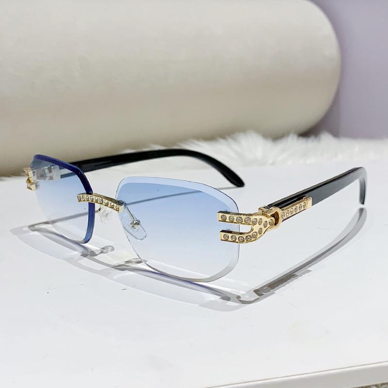 

Европейские и американские роскошные женские солнцезащитные очки без оправы, инкрустированные бриллиантами, с модной пряжкой-подковкой