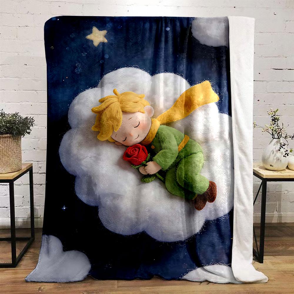 A childlike figure sleeps on a fluffy cloud, holding a red rose. for all seasons blanket lunch break throw gift