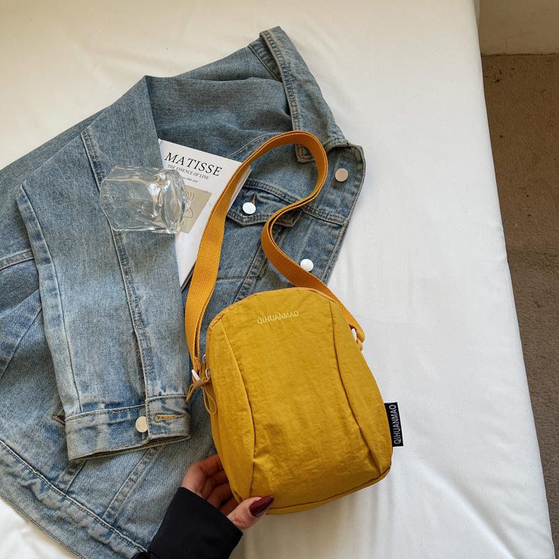 Versatile small bag Crossbody bag Women's casual canvas bag Light commuter cloth bag Men's mobile phone bag