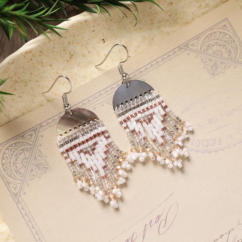 

Нишевый дизайн ручной работы серьги из ракушек и рисовых бусин ретро высококлассные богемные женские украшения для ушей