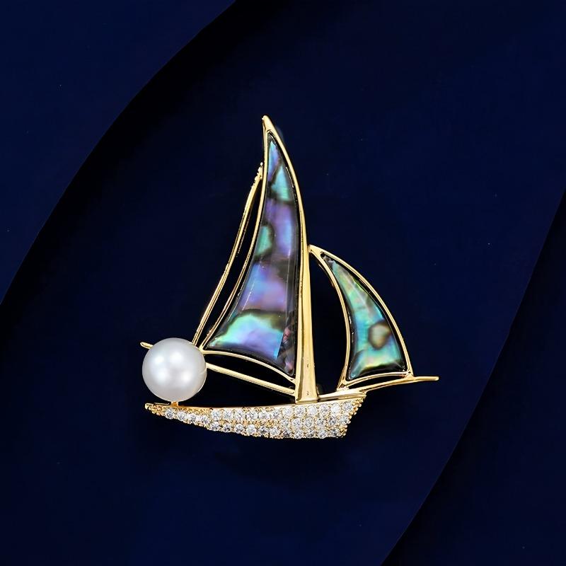 The "Smooth Sailing" Brooch Is A High-end Women's Design with A Unique and Exquisite Sailboat Corsage