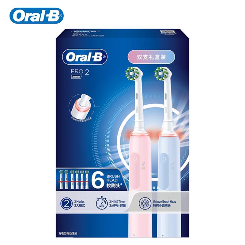 

Oral B Pro2 Набор 2-в-1 Синий и Розовый Электрическая зубная щетка 2 Рукоятки 6 Насадок 1 Зарядное устройство 2 ШТ/Коробка