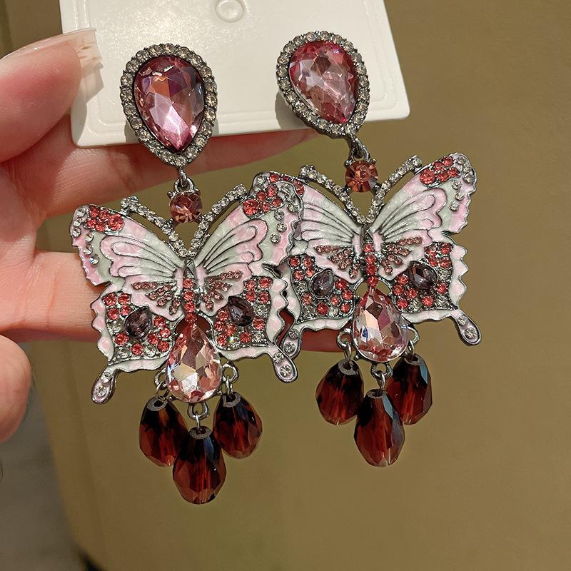 

Silver needle diamond butterfly crystal earrings European and American retro light luxury stud earrings niche exaggerated high-end earrings women