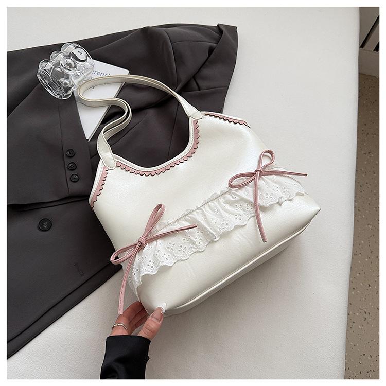 

Premium sense super fire tote bag women s 2025 new light luxury niche commuter portable shoulder bag fashion versatile bag