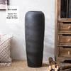 Jingdezhen Black Coarse Pottery Floor Vase: Modern Minimalist Japanese Decor for Hotel, Homestay, or Living Room.