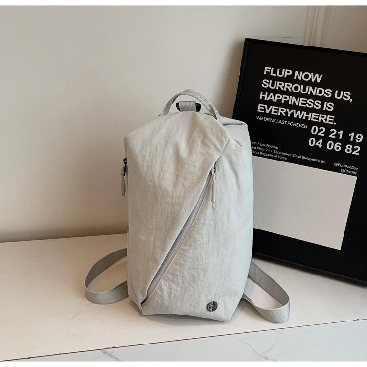 

Simple and lightweight three-purpose backpack women s 2025 new casual versatile texture messenger bag nylon commuter bag