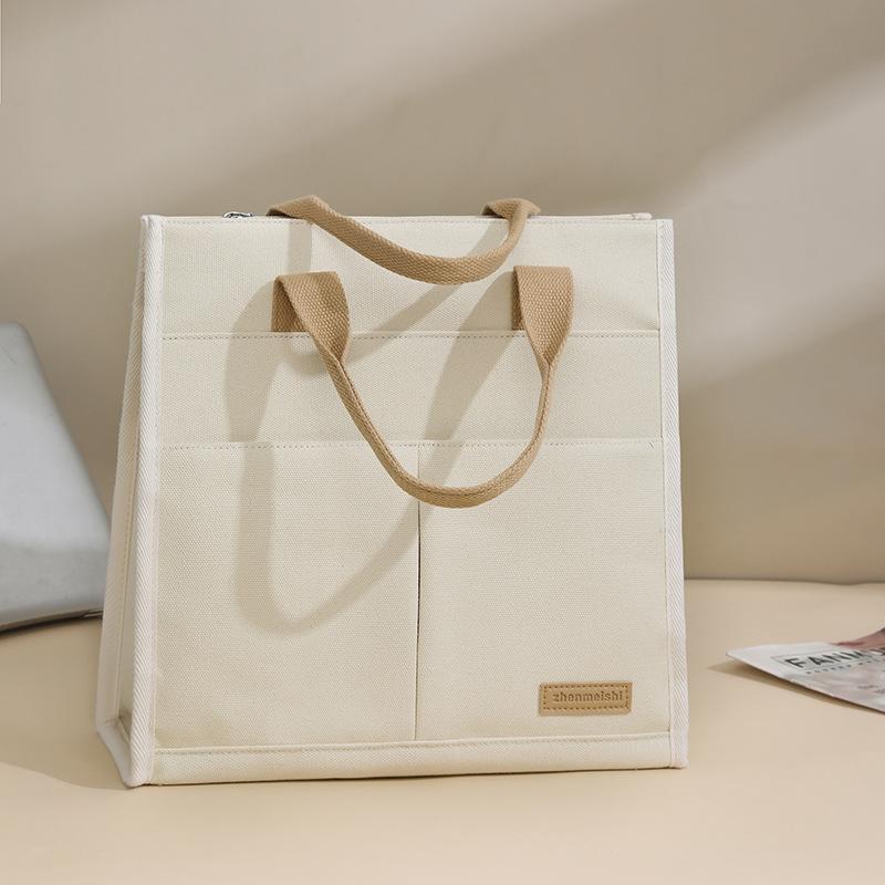 The Handbag Is Fashionable and Simple The Computer Bag Is Lightweight The Document Bag Is A Tote Bag