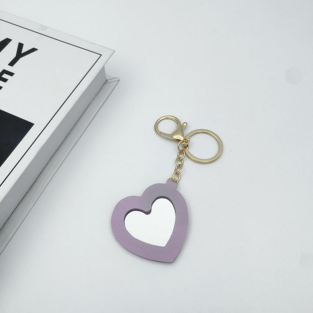 Přenosné pouzdro na rtěnku ve tvaru srdce s ochrannou kůží a roztomilou klíčenkou s přívěskem