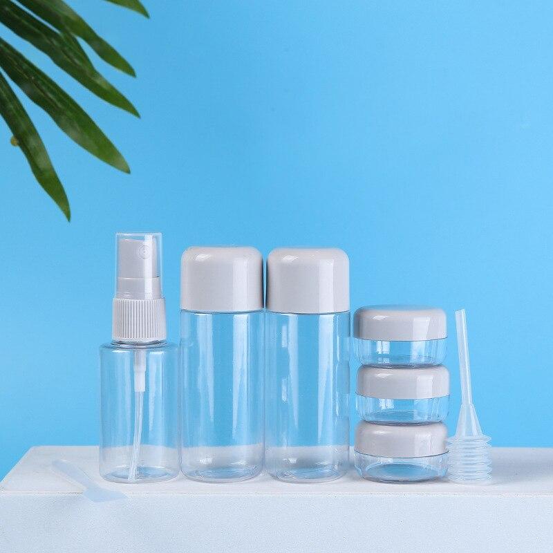 Trucco da viaggio imbottigliato in flacone spray lozione da otto pezzi, scatola crema è portatile e può essere portato a bordo con una borsa portaoggetti