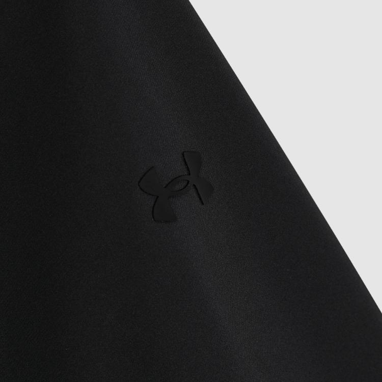 Under Armour Jednobarevná volná bunda se zipem a více kapsami Dámské bundy Černá 1388061-001
