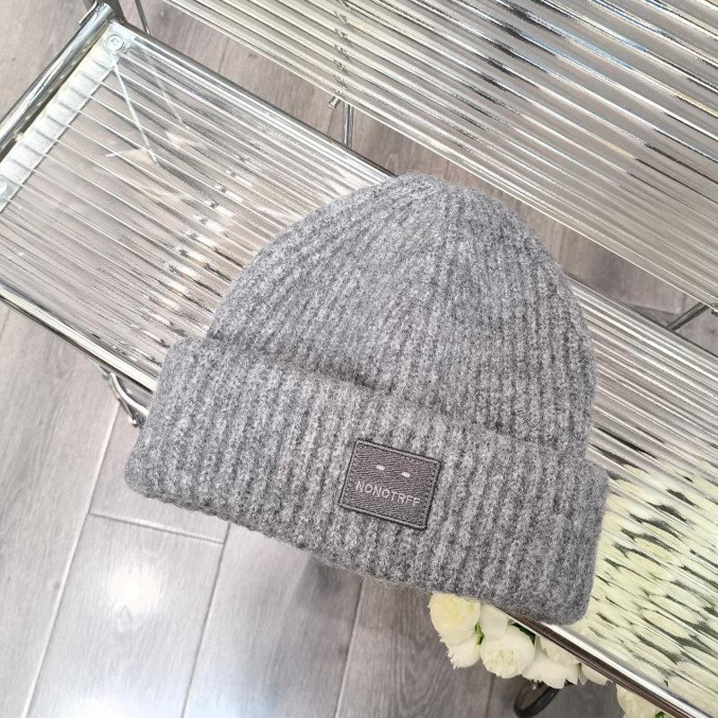 Autumn and winter wool hat women's loose sticker big head circumference beige cold hat warm and thickened new ear protection knitted hat