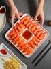 Kreativ dumplingtallrik i japansk stil med såsskål