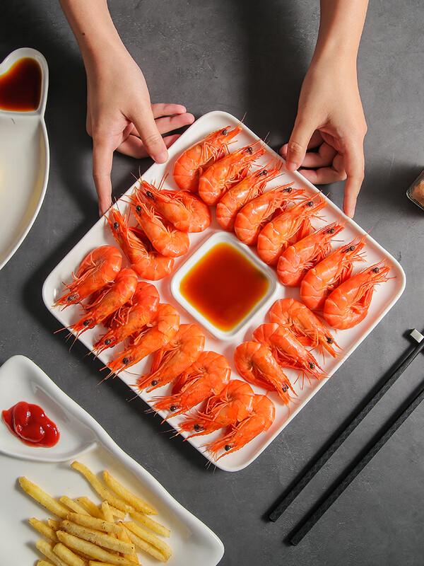 Kreativ dumplingtallrik i japansk stil med såsskål