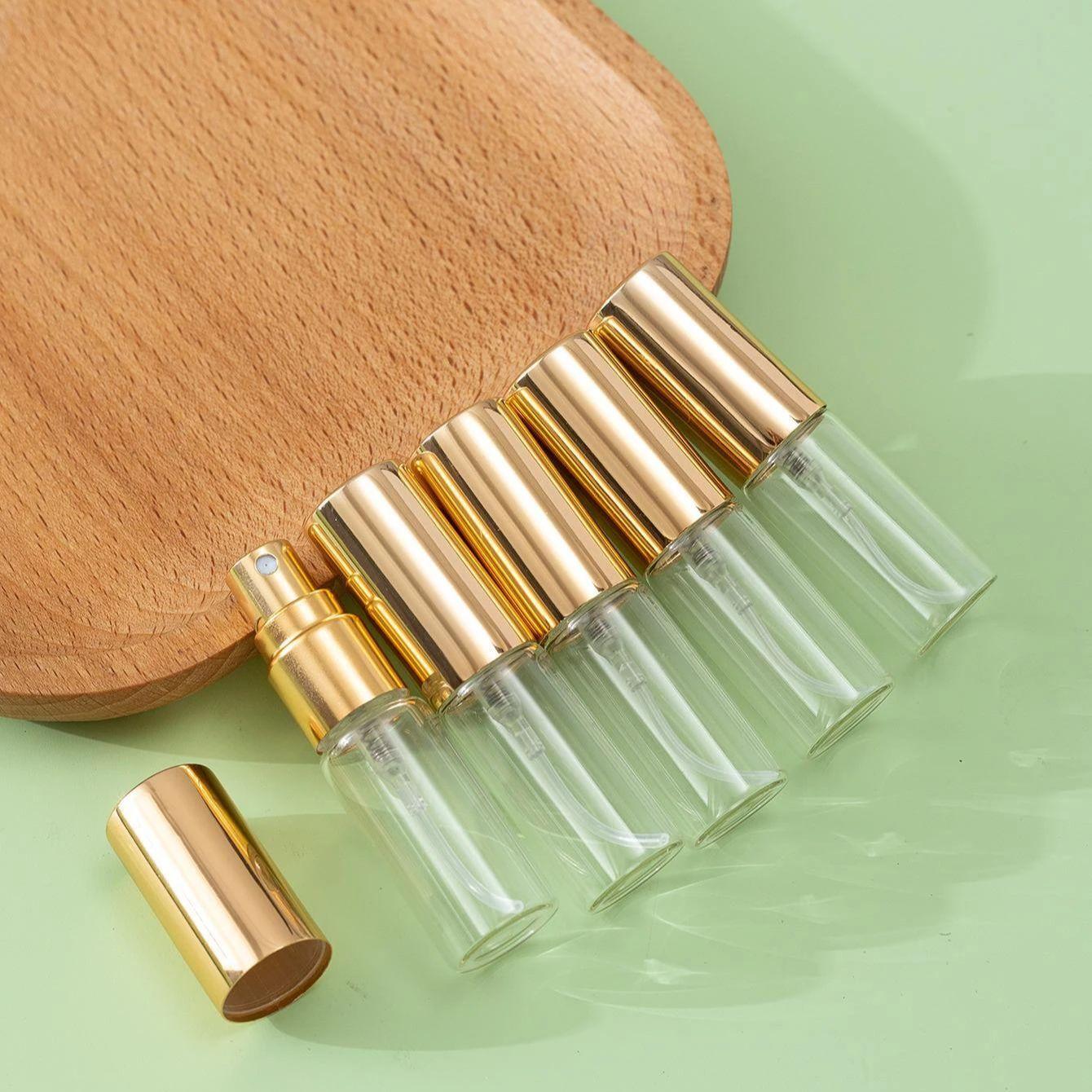 

5 шт. + 4 аксессуара. Флакон-распылитель для духов объемом 5 мл с 5 флаконами-распылителями, 2 воронками, 2 дозаторами. 5ml&glass