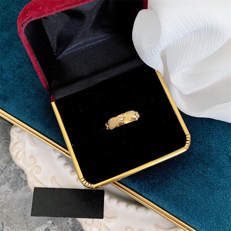 Gold-Plated Titanium Steel Ring with Diamonds and Eight-Pointed Star Design