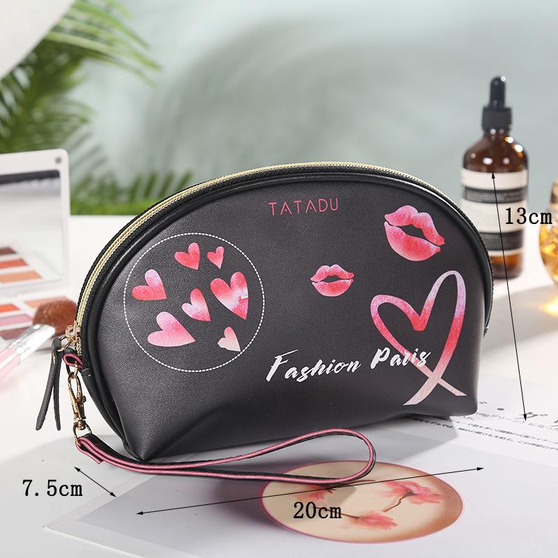 

Нова європейська американська жіноча косметична сумка в смужку. Творча сумка для пельменів. Помада. Розпис спреєм. Ручна сумка. Сумка для зберігання косметики.