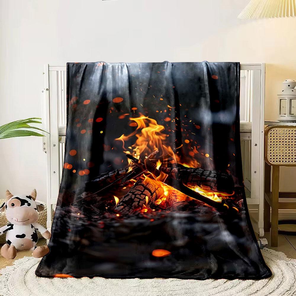 Glowing orange embers and flames with scattered sparks in dim surroundings. for all seasons blanket lunch break throw gift 80cm x 120cm