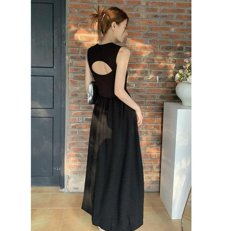 Black round neck sleeveless French retro super fairy knee dress women's spring design hollow backless long dress