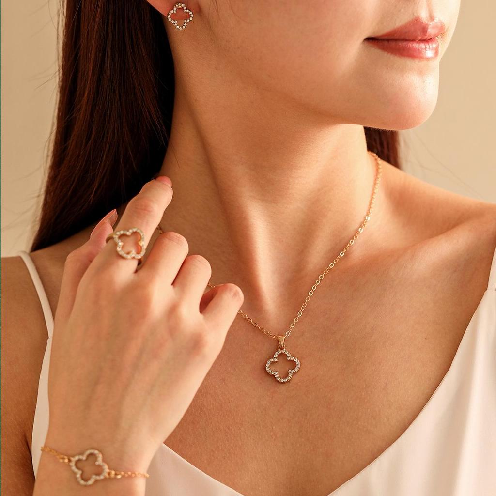 Hot-Selling Jewelry Set: Fashionable Four-Leaf Clover Hollow Diamond Necklace, Bracelet, Earrings, and Ring