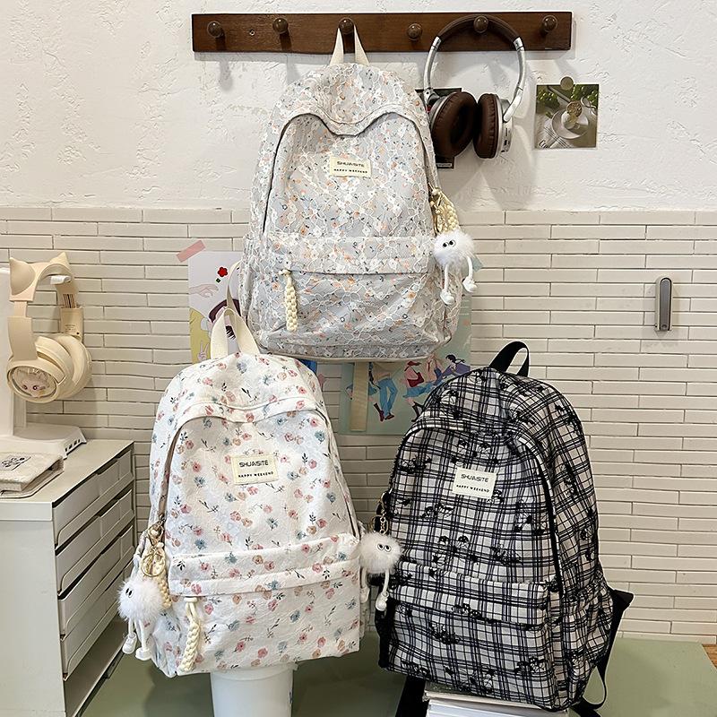 New high-value Japanese schoolbag ins niche backpack girl college student versatile junior high school floral backpack