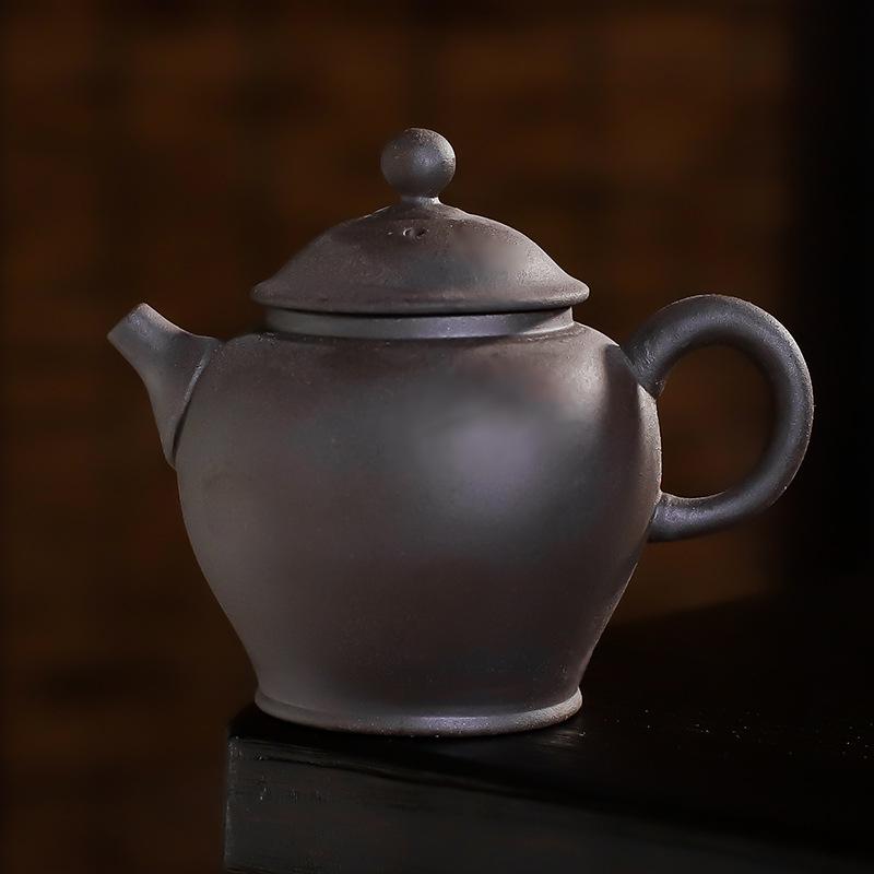 

Чайник Кунг-фу, маленький керамический чайник для заваривания чая в одной чашке, представляет собой полностью изготовленный вручную небольшой чайный сервиз в китайском стиле.