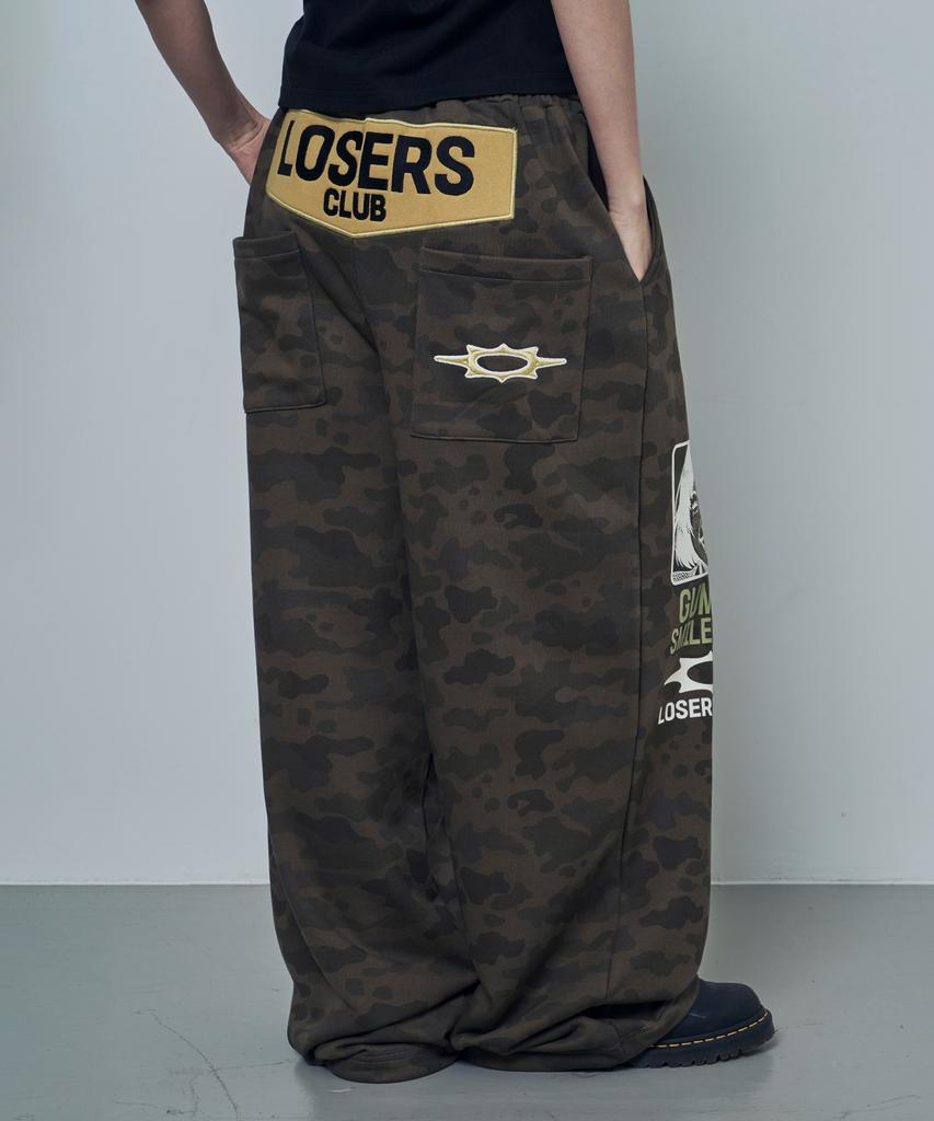 Lujeoseukeulleob Gummy Smile Club Wide Sweatpants Camo
