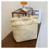 New straw bag hand-woven tassel fashion simple handheld women's bag large capacity shoulder bag women