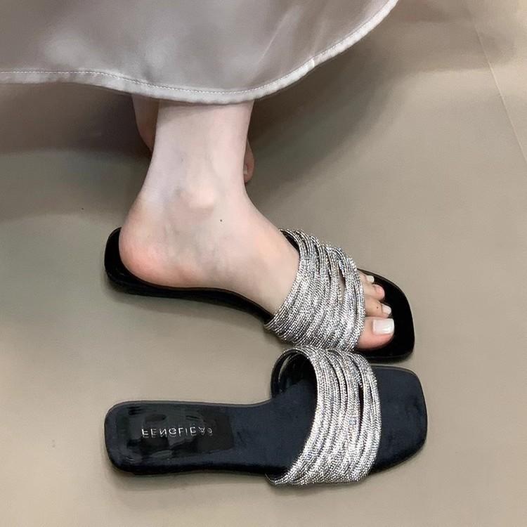 Fashion one-word slippers women's 2025 summer new outer wear lazy rhinestones with low heels open-toed sandals high sense