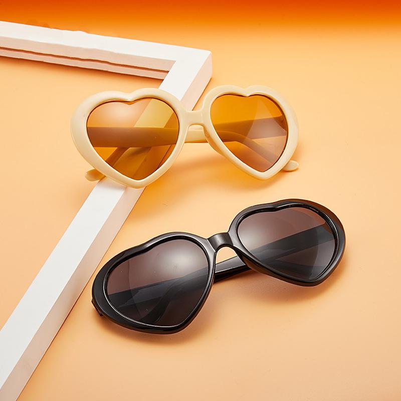 Peach heart Sunglasses love Sunglasses European and American trend frameless conjoined Sunglasses dazzling color glasses