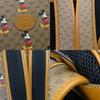 Used GUCCI Backpack Â· Daypack Small backpack 552884 GG Supreme Canvas Brown Camel Mickey Mouse