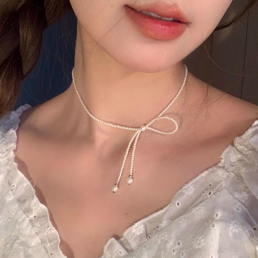 Super fairy bow pearl necklace fashion design collarbone chain colored stone light luxury Internet celebrity accessories neck chain