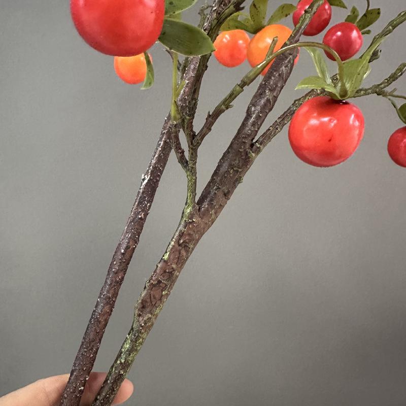 Konstgren med mini persimonblommor för heminredning