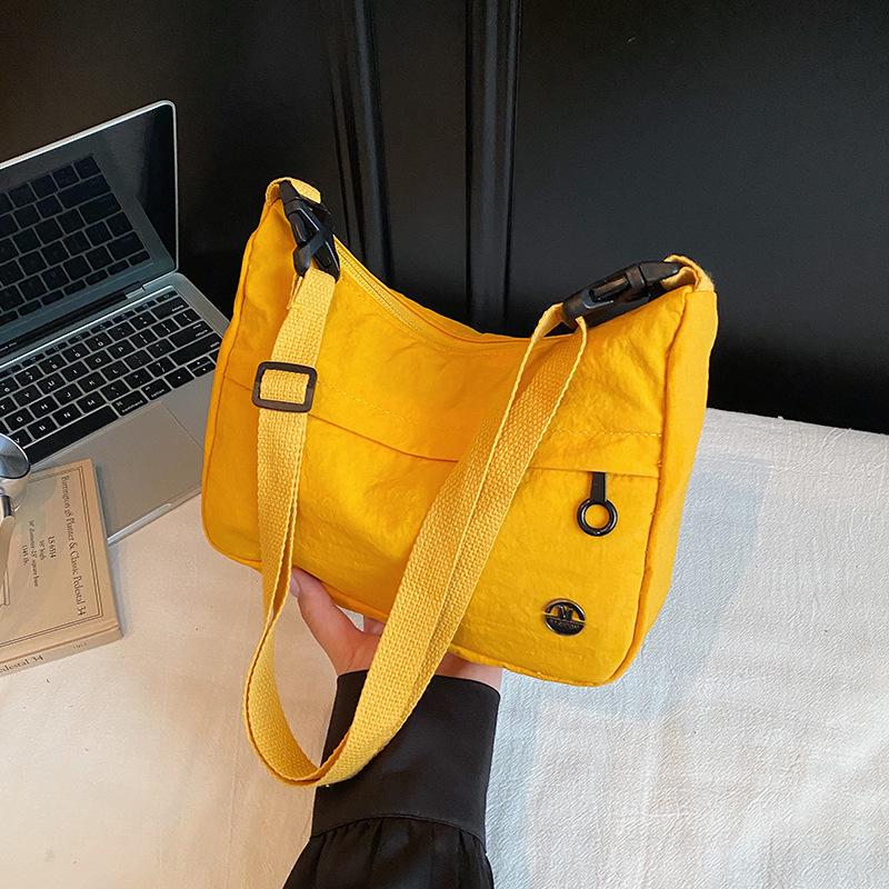 

Simple texture messenger bag women s sports lightweight large-capacity class commuter backpack versatile casual shoulder bag women жёлтый