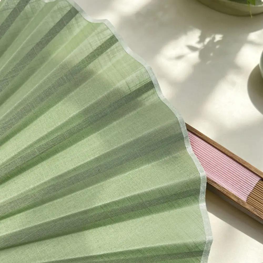Cotton Linen Cloth Folding Hand Fan Bamboo Frame with Tassel Mini Shell Fan Shell-Shaped Decoration Retro Handheld Fan