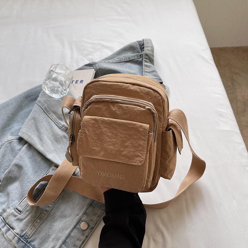 

Multi-pocket shoulder bag women s fashion casual solid color messenger bag men s messenger bag light sports 2025 summer new хаки