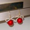 Orecchini pendenti con nodo a fiocco di cristallo di nuova moda per le donne Orecchini pendenti con zirconi a forma di cuore di perla rossa Regali di gioielli per festival di Capodanno di Natale