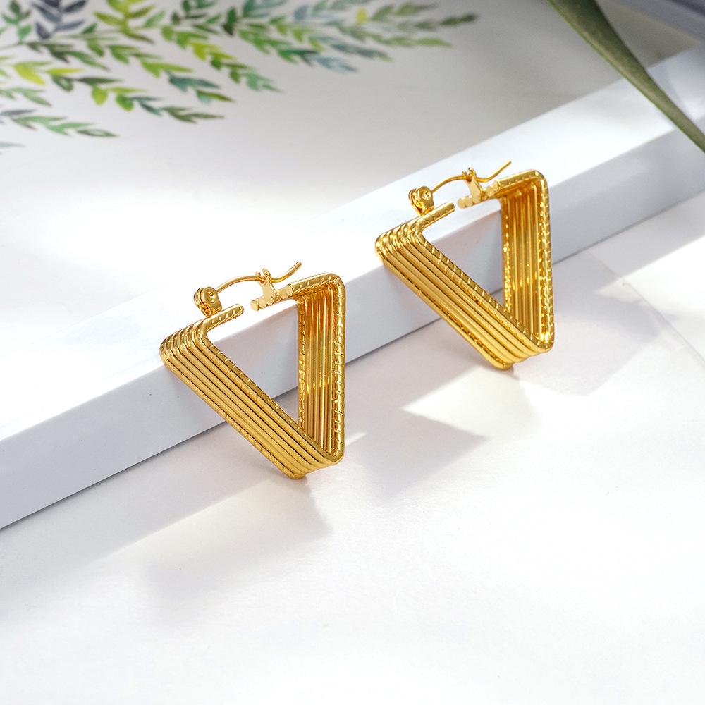 IMI Titanium Steel Twisted Line Hoop Earrings - Light Luxury Geometric Design