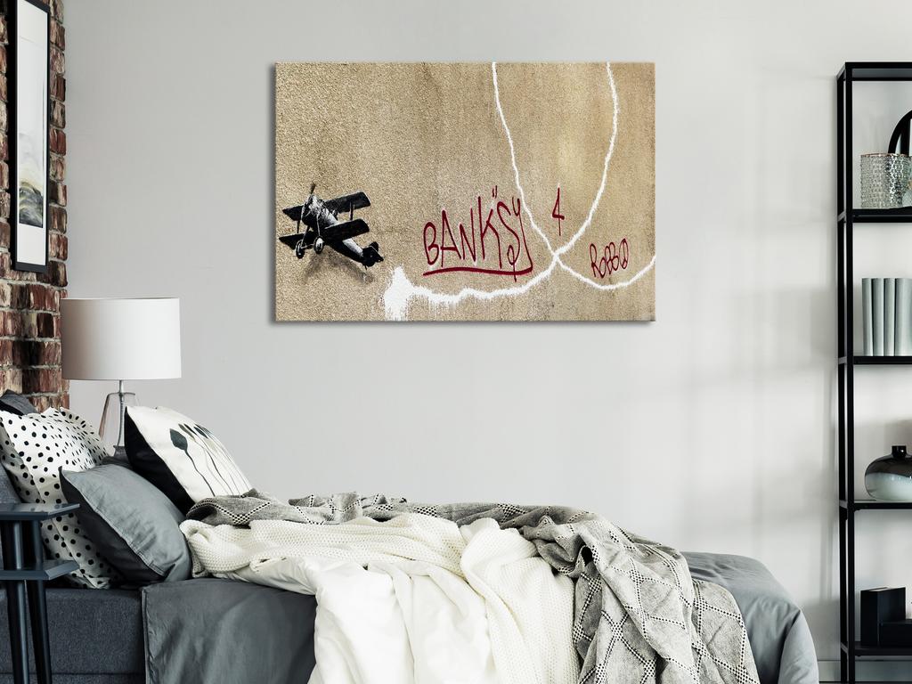 Obraz - Samolot Banksy (1-Częściowy) - Graffiti Czerwone Napisy Na Tle Muralu