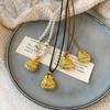 Elegant Chinese Style Gold Pendant Necklace: Exquisite, Versatile Sweater Chain & Luxury Accessory