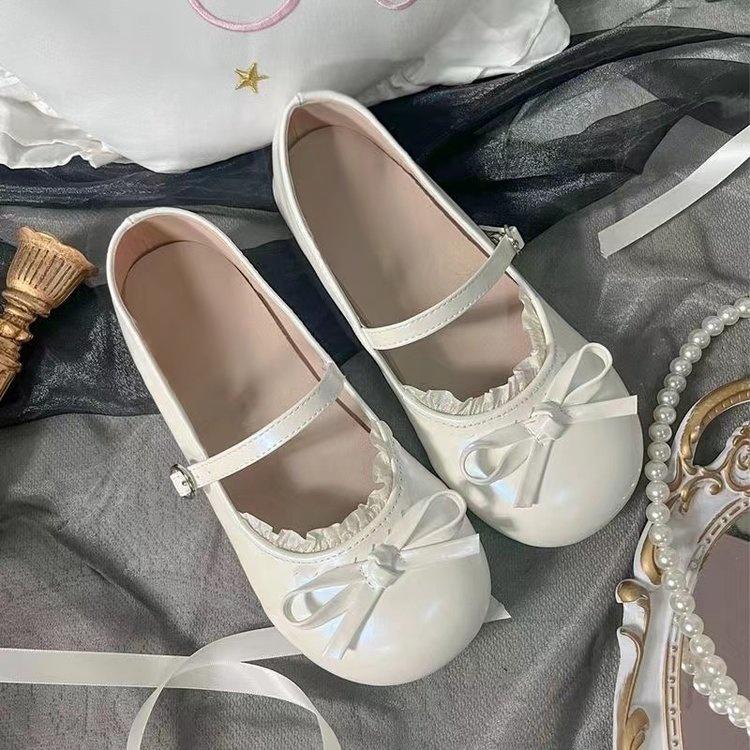 2025 new French retro white round head bow flat-soled single shoes women's spring one-pedal soft-soled beanie shoes