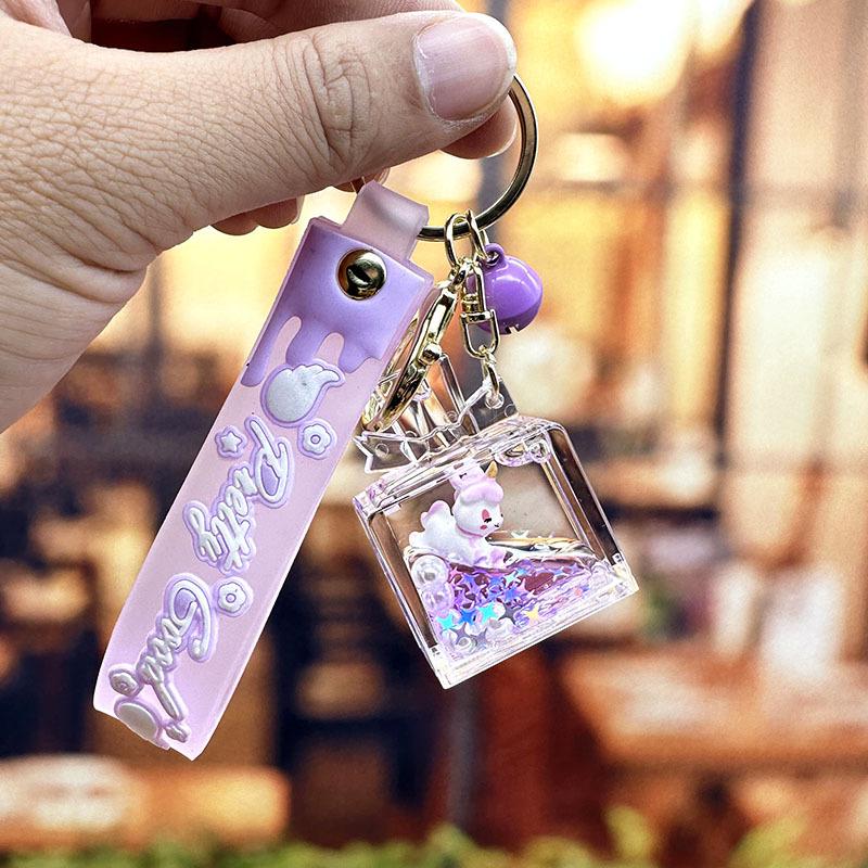 Lila Stern Flüssiger Treibsand Schlüsselanhänger mit Kirschblüten Öl-gefülltem Anhänger - Niedlicher 3D Rucksackanhänger für Frauen