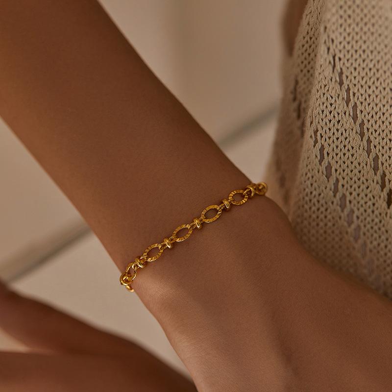 Gold Plated Textured Circle Link Bracelet With Extension Chain
