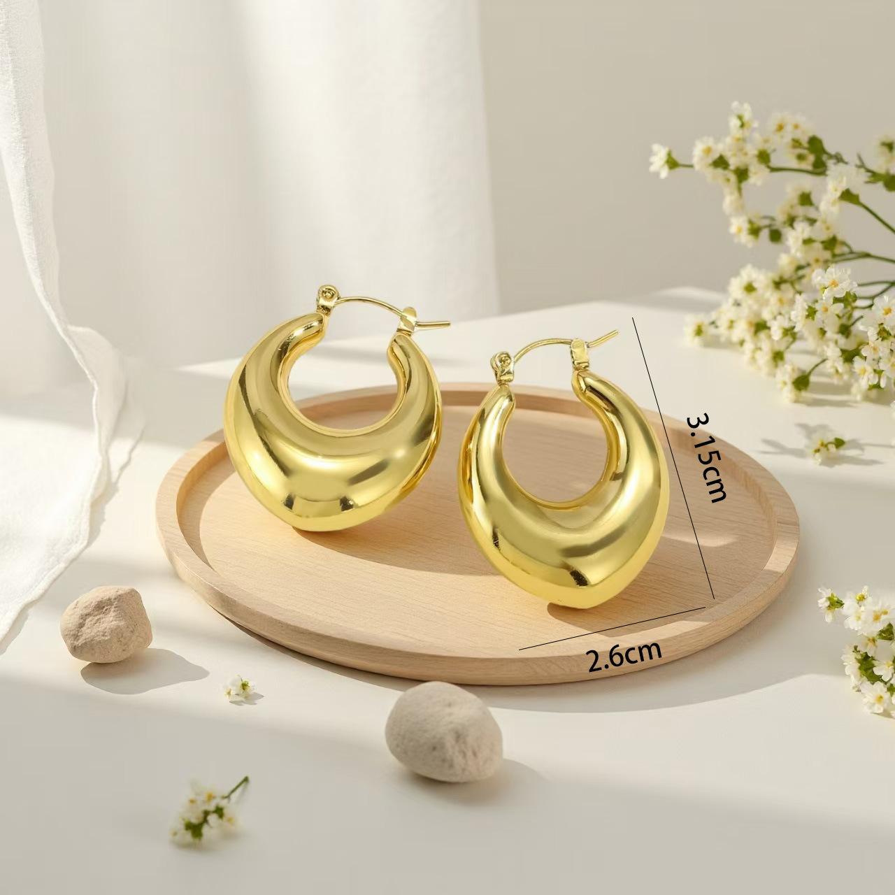 

Premium earrings hollow earrings stainless steel European and American glossy earrings simple water drop 11K personalized vacuum plating
