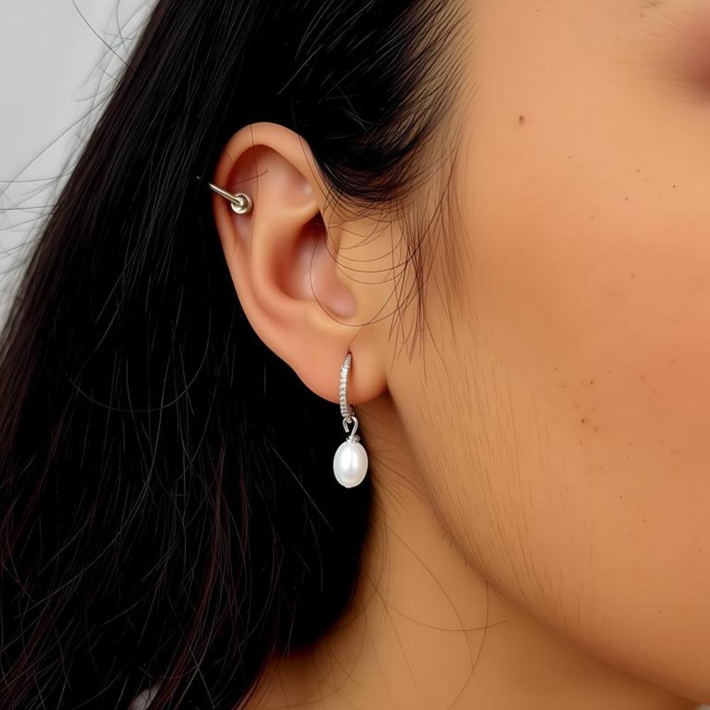 Ohrringe mit weißem Zirkonia und Perlenimitat