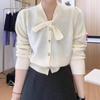 Spring new simple and versatile knitted cardigan solid color top bow design sense long sleeve sweater jacket