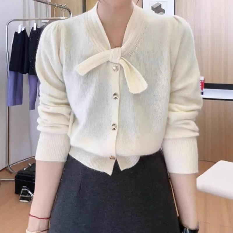 Spring new simple and versatile knitted cardigan solid color top bow design sense long sleeve sweater jacket